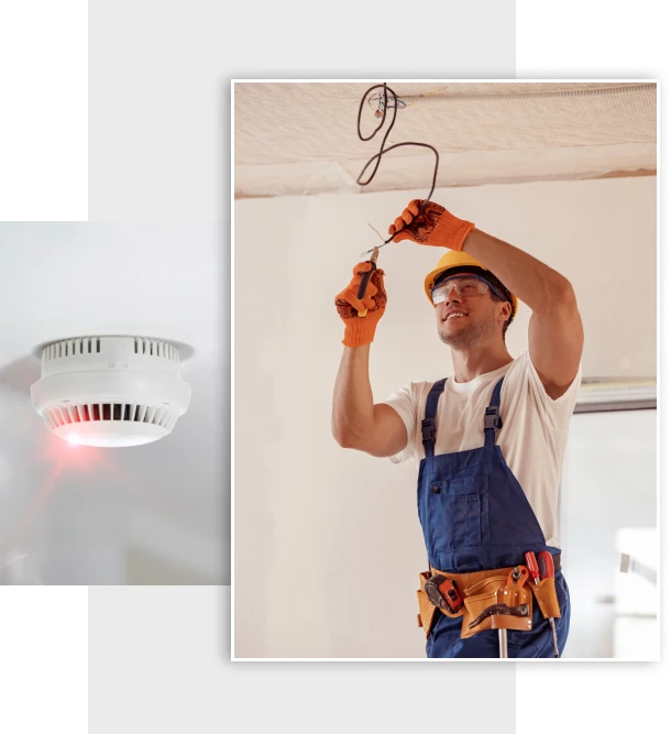 Electrician installing a smoke detector